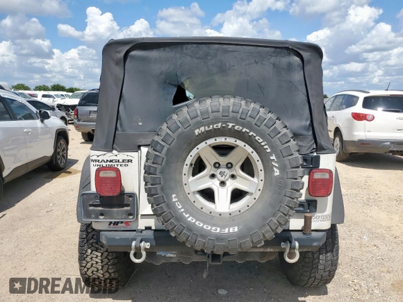 2004 Jeep Wrangler Sport z VIN 1J4FA49SX4P802341, wystawiony jako Copart lot #62752565 z przebiegiem 150 197 mil mil oraz Szkoda całkowita • Salvage title. Historia ofert i sprzedaży dostępna na DreamBid. Obrazek 6.