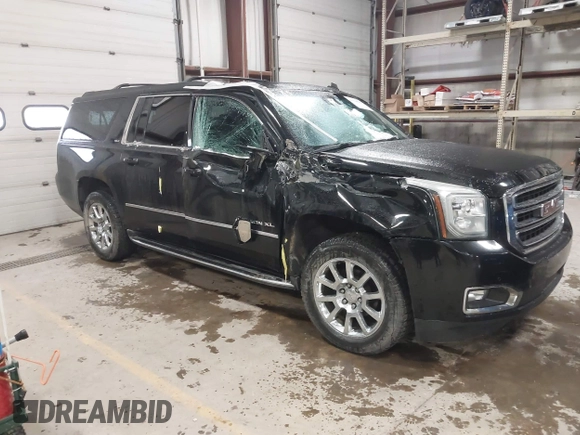 2015 GMC Yukon XL SLT with VIN 1GKS2HKC9FR175011, listed as a IAAI auction lot 41510519 with 194,136 mi miles. Bid and sale history available at carsss.com. Image 1.