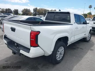 2024 Toyota Tacoma 4WD SR5 with VIN 3TYLB5JN4RT009863, listed as a IAAI auction lot 42054379 with 8,360 mi miles. Bid and sale history available at carsss.com. Image 4.