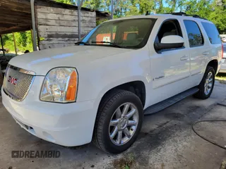 2007 GMC Yukon SLT z VIN 1GKFK13007R320600, wystawiony jako IAAI lot #42345051 z przebiegiem 237 533 mil mil oraz . Historia ofert i sprzedaży dostępna na DreamBid. Obrazek 1.