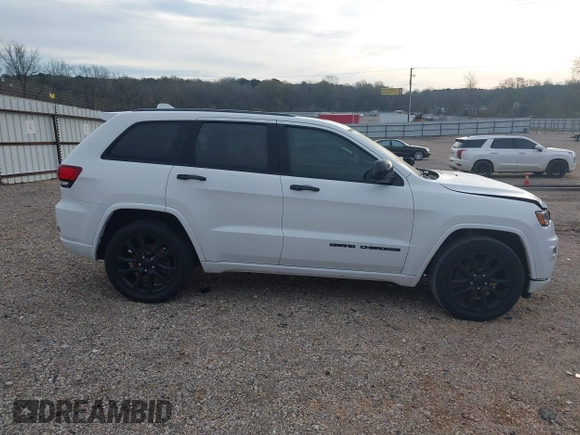 2019 Jeep Grand Cherokee Altitude with VIN 1C4RJEAG3KC572713, listed as a IAAI auction lot 41348420 with 133,735 mi miles and . Bid and sale history available at DreamBid. Image 14.