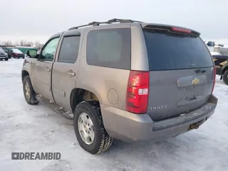 2013 Chevrolet Tahoe LT with VIN 1GNSKBE0XDR296094, listed as a IAAI auction lot 41448160 with 167,165 mi miles and . Bid and sale history available at DreamBid. Image 3.