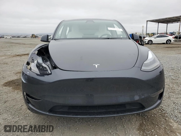 2024 Tesla Model Y z VIN 7SAYGDED4RF103411, wystawiony jako Copart lot #59982815 z przebiegiem 17 601 mil mil oraz Szkoda całkowita • Salvage title. Historia ofert i sprzedaży dostępna na DreamBid. Obrazek 5.