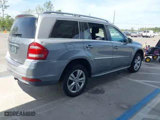 2011 Mercedes-Benz GL-Class GL 450 with VIN 4JGBF7BE9BA697556, listed as a IAAI auction lot 41897239 with 210,120 mi miles. Bid and sale history available at carsss.com. Image 4.