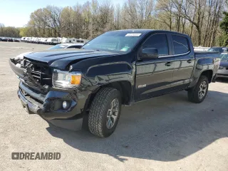 2018 GMC Canyon 4WD SLT z VIN 1GTG6DEN0J1241741, wystawiony jako Copart lot #53724685 z przebiegiem 84 980 mil mil oraz Czysty tytuł • Clean title. Historia ofert i sprzedaży dostępna na DreamBid. Obrazek 1.