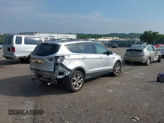 2013 Ford Escape SEL с VIN 1FMCU9H92DUB12172, выставлен на аукционе IAAI как лот 42625786 с пробегом 149 770 миль миль и . История ставок и продаж доступна на DreamBid. Изображение 4.