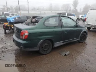 2000 Toyota ECHO with VIN JTDAT1231Y0041399, listed as a Copart auction lot 83774514 with 128,465 mi miles and Salvage Title. Bid and sale history available at DreamBid. Image 3.