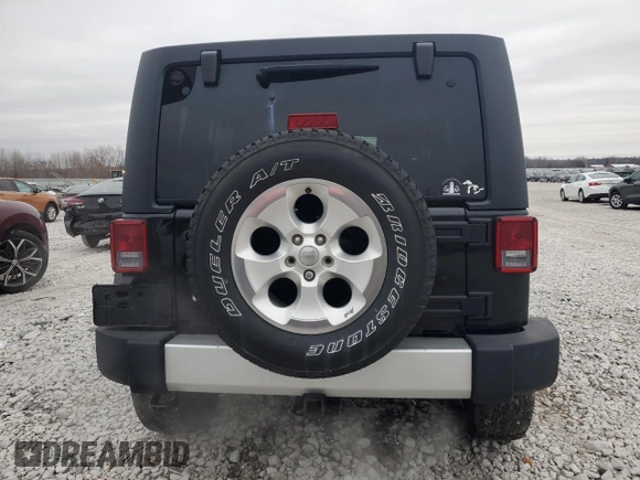 2015 Jeep Wrangler Unlimited Sahara with VIN 1C4BJWEGXFL606573, listed as a Copart auction lot 83983894 with 103,314 mi miles and Clean title. Bid and sale history available at DreamBid. Image 6.
