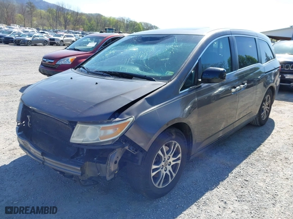 2011 Honda Odyssey EX-L with VIN 5FNRL5H60BB072101, listed as a IAAI auction lot 42002097 with 243,607 mi miles. Bid and sale history available at carsss.com. Image 6.