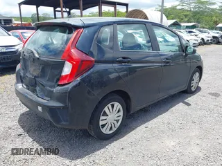 2017 Honda Fit LX z VIN 3HGGK5H58HM706357, wystawiony jako IAAI lot #42371826 z przebiegiem 91 099 mil mil oraz . Historia ofert i sprzedaży dostępna na DreamBid. Obrazek 4.