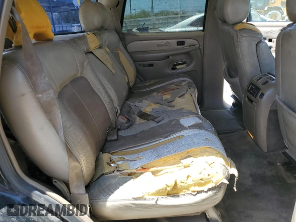 2002 GMC Yukon Denali z VIN 1GKEK63U62J241161, wystawiony jako Copart lot #58350085 z przebiegiem Nie podano mil oraz Szkoda całkowita • Salvage title. Historia ofert i sprzedaży dostępna na DreamBid. Obrazek 11.