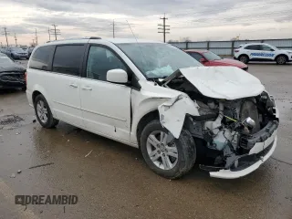 2013 Dodge Grand Caravan Crew with VIN 2C4RDGDG5DR740098, listed as a Copart auction lot 84491644 with 146,400 mi miles and Salvage Title. Bid and sale history available at DreamBid. Image 4.