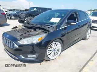 2018 Ford Focus Titanium with VIN 1FADP3N21JL289677, listed as a IAAI auction lot 42183812 with Not provided miles and . Bid and sale history available at DreamBid. Image 2.