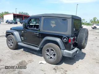 2019 Jeep Wrangler Sport S with VIN 1C4GJXAG2KW664395, listed as a IAAI auction lot 42683888 with 72,742 mi miles and . Bid and sale history available at DreamBid. Image 3.