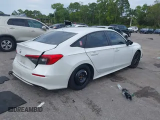 2022 Honda Civic Sport z VIN 2HGFE2F58NH560122, wystawiony jako IAAI lot #41193826 z przebiegiem 50 005 mil mil oraz . Historia ofert i sprzedaży dostępna na DreamBid. Obrazek 4.