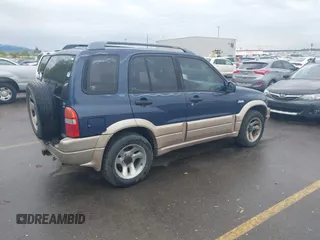 2001 Suzuki Grand Vitara JLX z VIN JS3TD62VX14165885, wystawiony jako IAAI lot #42091059 z przebiegiem 197 030 mil mil oraz . Historia ofert i sprzedaży dostępna na DreamBid. Obrazek 4.