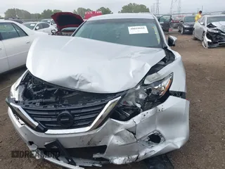 2018 Nissan Altima SR with VIN 1N4AL3AP6JC151861, listed as a IAAI auction lot 40010666 with 140,228 mi miles and . Bid and sale history available at DreamBid. Image 12.