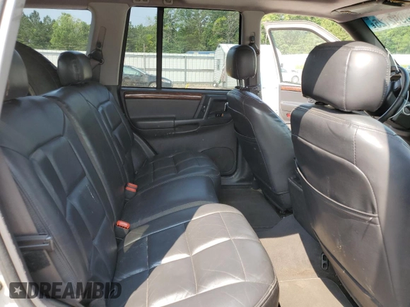 1998 Jeep Grand Cherokee Limited with VIN 1J4GZ78Y5WC324828, listed as a Copart auction lot 58992125 with 225,705 mi miles and Salvage title. Bid and sale history available at DreamBid. Image 11.