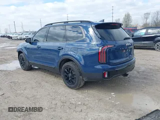 2024 Kia Telluride SX Prestige X-Line z VIN 5XYP5DGC4RG461605, wystawiony jako IAAI lot #41926195 z przebiegiem 13 811 mil mil oraz . Historia ofert i sprzedaży dostępna na DreamBid. Obrazek 3.