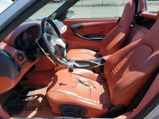 1998 Porsche Boxster z VIN WP0CA2986WU620657, wystawiony jako Copart lot #55595275 z przebiegiem 78 711 mil mil oraz Szkoda całkowita • Salvage title. Historia ofert i sprzedaży dostępna na DreamBid. Obrazek 7.