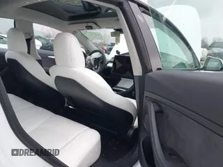 2022 Tesla Model 3 Long Range with VIN 5YJ3E1EB6NF272009, listed as a IAAI auction lot 41984154 with 12,651 mi miles and . Bid and sale history available at DreamBid. Image 8.