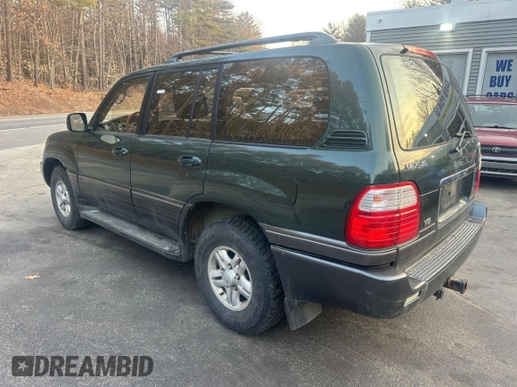 2000 Lexus LX 470 z VIN JT6HT00W5Y0105585, wystawiony jako Copart lot #49099395 z przebiegiem 153 695 mil mil oraz Czysty tytuł • Clean title. Historia ofert i sprzedaży dostępna na DreamBid. Obrazek 3.
