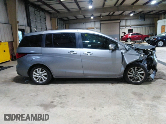 2013 Mazda 5 Sport with VIN JM1CW2BL5D0156684, listed as a IAAI auction lot 41966696 with 121,654 mi miles and . Bid and sale history available at DreamBid. Image 14.