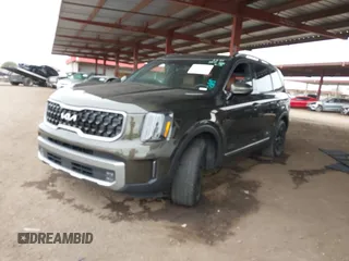 2023 Kia Telluride SX Prestige X-Line with VIN 5XYP5DGC5PG407971, listed as a IAAI auction lot 41578334 with 50,481 mi miles and . Bid and sale history available at DreamBid. Image 2.