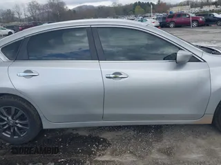 2015 Nissan Altima S with VIN 1N4AL3AP0FN900696, listed as a IAAI auction lot 41960816 with 168,139 mi miles and . Bid and sale history available at carsss.com. Image 14.