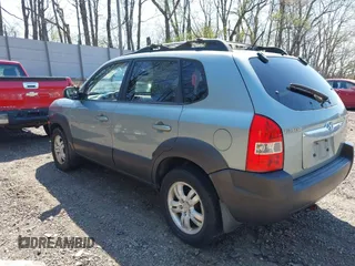 2006 Hyundai Tucson GLS with VIN KM8JN12D06U285856, listed as a IAAI auction lot 42112640 with 157,016 mi miles. Bid and sale history available at carsss.com. Image 3.