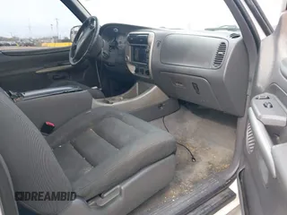 2001 Ford Explorer Sport z VIN 1FMYU60E61UB69970, wystawiony jako IAAI lot #41492397 z przebiegiem 239 040 mil mil oraz . Historia ofert i sprzedaży dostępna na DreamBid. Obrazek 5.