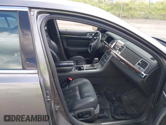 2011 Lincoln MKS EcoBoost with VIN 1LNHL9FT3BG610366, listed as a IAAI auction lot 42274043 with 196,811 mi miles and . Bid and sale history available at DreamBid. Image 5.