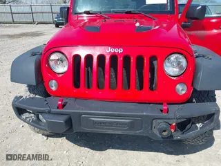 2015 Jeep Wrangler Unlimited Rubicon Hard Rock with VIN 1C4HJWFG9FL525556, listed as a IAAI auction lot 41973576 with 246,949 mi miles. Bid and sale history available at carsss.com. Image 6.