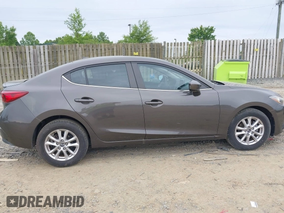 2015 Mazda 3 i Grand Touring z VIN JM1BM1W76F1223850, wystawiony jako IAAI lot #42356420 z przebiegiem 45 514 mil mil oraz . Historia ofert i sprzedaży dostępna na DreamBid. Obrazek 13.