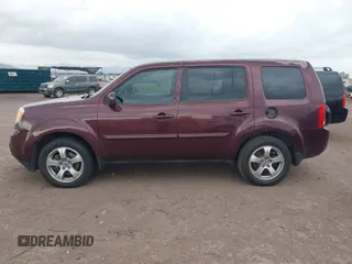 2012 Honda Pilot EX-L with VIN 5FNYF3H59CB040568, listed as a IAAI auction lot 42195882 with 211,487 mi miles and . Bid and sale history available at carsss.com. Image 14.