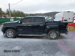 2015 GMC Canyon 4WD SLT with VIN 1GTG6CE39F1202730, listed as a IAAI auction lot 41510275 with 114,444 mi miles. Bid and sale history available at carsss.com. Image 15.