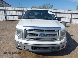2014 Ford F-150 XL with VIN 1FTFW1CTXEFC12946, listed as a IAAI auction lot 41814929 with 230,328 mi miles. Bid and sale history available at carsss.com. Image 6.