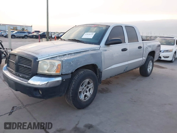 2005 Dodge Dakota SLT with VIN 1D7HW48N35S310086, listed as a IAAI auction lot 42020235 with 267,357 mi miles and . Bid and sale history available at DreamBid. Image 2.