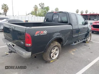 2003 Ford F-150 XL with VIN 1FTRX18LX3NB16806, listed as a IAAI auction lot 42065093 with 110,480 mi miles. Bid and sale history available at carsss.com. Image 4.