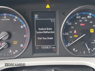 2018 Toyota RAV4 LE with VIN 2T3BFREV6JW740214, listed as a IAAI auction lot 42106349 with 105,831 mi miles and . Bid and sale history available at carsss.com. Image 16.