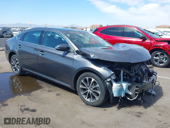 2018 Toyota Avalon XLE with VIN 4T1BK1EB5JU276828, listed as a IAAI auction lot 42141640 with 75,815 mi miles. Bid and sale history available at carsss.com. Image 1.