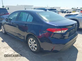 2023 Toyota Corolla LE with VIN 5YFB4MDE8PP033659, listed as a IAAI auction lot 42020847 with 42,624 mi miles. Bid and sale history available at carsss.com. Image 3.