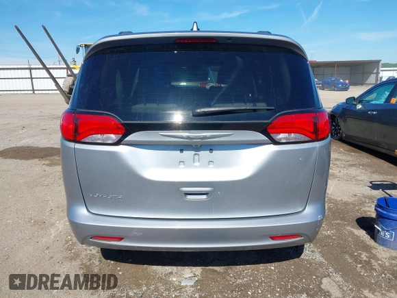 2021 Chrysler Voyager LXi z VIN 2C4RC1DG4MR568260, wystawiony jako IAAI lot #42187861 z przebiegiem Nie podano mil oraz . Historia ofert i sprzedaży dostępna na DreamBid. Obrazek 16.