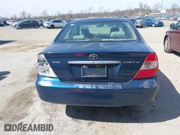 2002 Toyota Camry LE z VIN JTDBE32KX20111362, wystawiony jako IAAI lot #41820475 z przebiegiem 270 091 mil mil oraz . Historia ofert i sprzedaży dostępna na DreamBid. Obrazek 16.