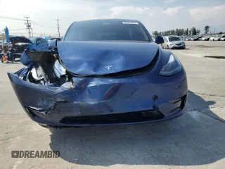 2024 Tesla Model Y with VIN 7SAYGDED0RF102479, listed as a Copart auction lot 55431975 with 23,989 mi miles and Salvage title. Bid and sale history available at DreamBid. Image 5.