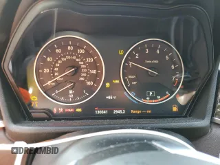 2017 BMW X1 xDrive28i with VIN WBXHT3C33H5F70208, listed as a Copart auction lot 67999764 with 130,341 mi miles and Salvage Title. Bid and sale history available at carsss.com. Image 9.