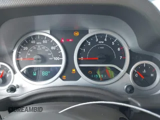 2010 Jeep Wrangler Sport with VIN 1J4AA2D17AL126737, listed as a IAAI auction lot 42237596 with 119,391 mi miles and . Bid and sale history available at carsss.com. Image 7.