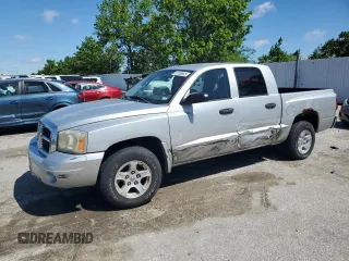 2006 Dodge Dakota SLT z VIN 1D7HE48K66S702859, wystawiony jako Copart lot #57769865 z przebiegiem 179 847 mil mil oraz Szkoda całkowita • Salvage title. Historia ofert i sprzedaży dostępna na DreamBid. Obrazek 1.