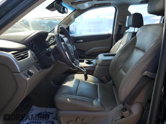 2018 GMC Yukon SLT with VIN 1GKS1BKC9JR108210, listed as a Copart auction lot 50465765 with 106,542 mi miles and Salvage Title. Bid and sale history available at carsss.com. Image 7.