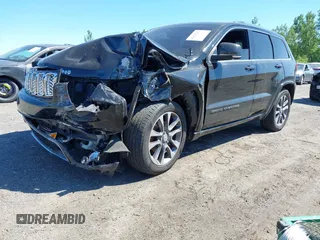 2017 Jeep Grand Cherokee Overland with VIN 1C4RJFCG0HC844713, listed as a IAAI auction lot 42293301 with 83,791 mi miles and . Bid and sale history available at DreamBid. Image 19.